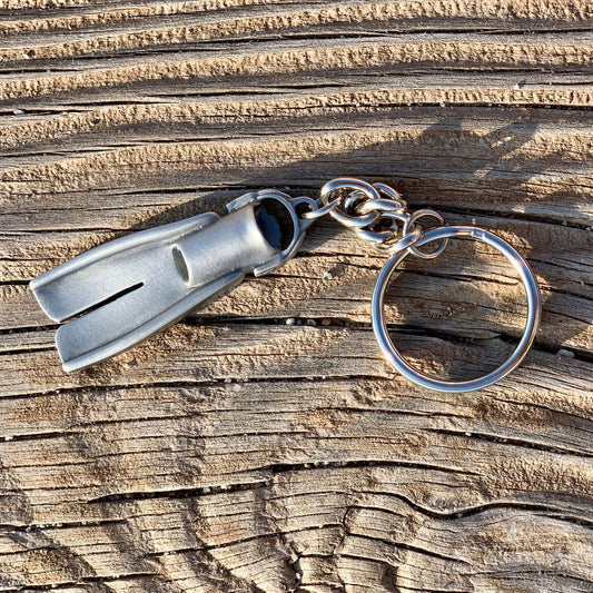 fin shaped keychain made from stainless steel